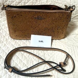 NWOT Coach Bag with detachable shoulder strap. Soft dusty pink. Glitter/Leather